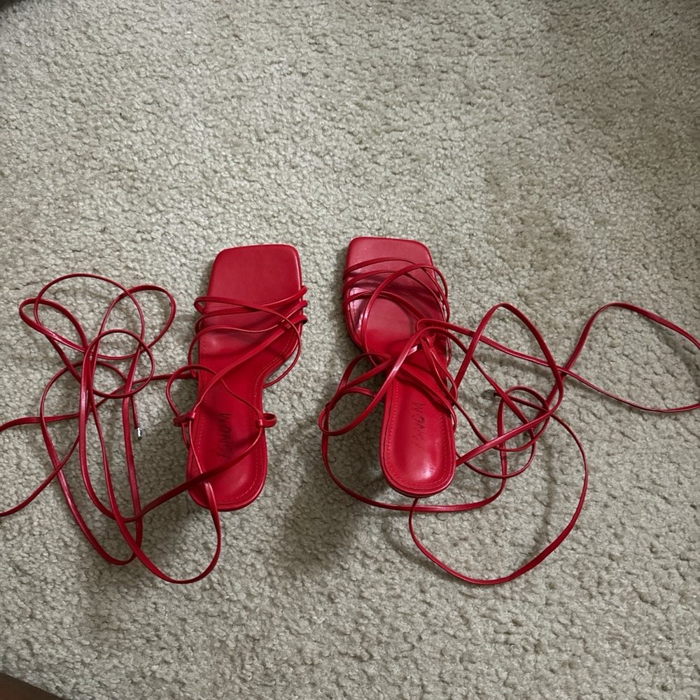Red strappy heels. worn twice!